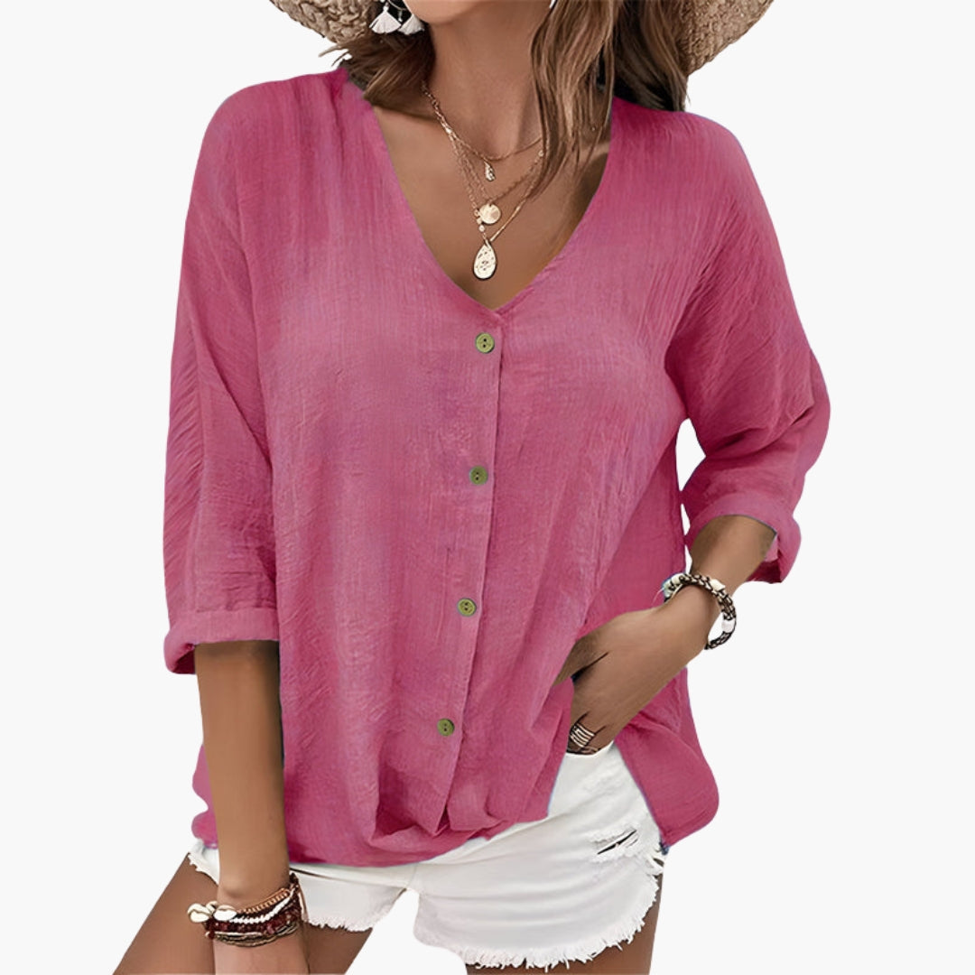 Back view of blouse showing straight hem and relaxed fit