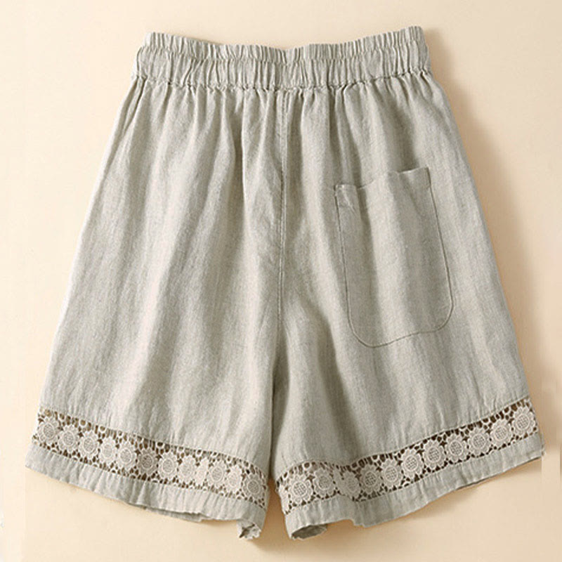 Model wearing cotton lace trim shorts, standing pose
