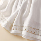 Flat lay of shorts showing front and back