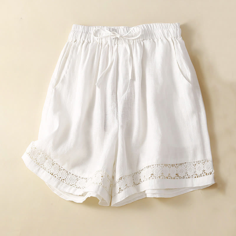Close-up of lace trim detail on shorts hem