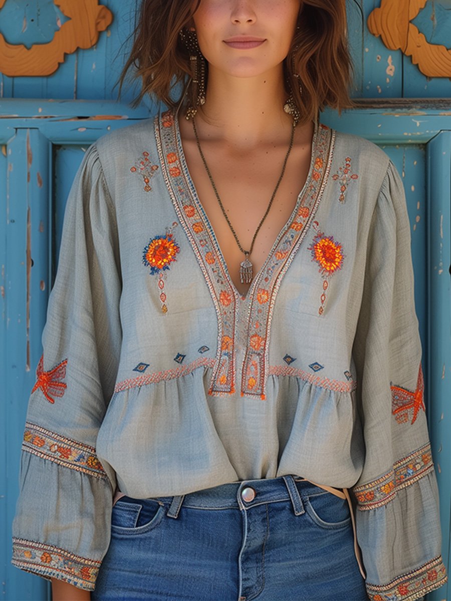 Sage green boho blouse with embroidered bodice and V-neckline, front view