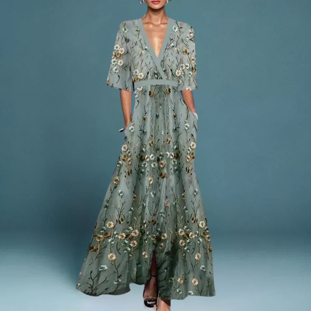 Sage green maxi dress with floral embroidery and sequin detailing, V-neckline and A-line skirt