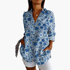Back view of shirt showing all-over floral embroidery pattern