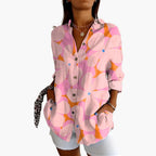 Model with rolled tab cuffs visible on full-length sleeves