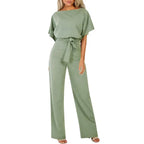 Women's sage green wide leg jumpsuit with short sleeves and belted waist, front view