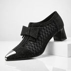 Side profile of heel showing block heel structure