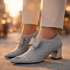 Close-up of rhinestone embellishments and metallic toe cap