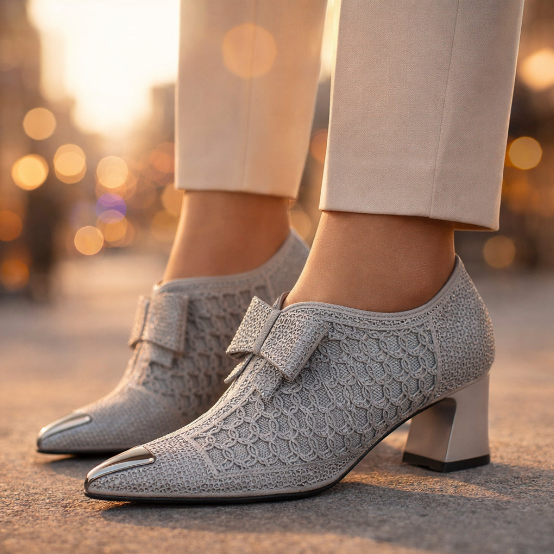 Close-up of rhinestone embellishments and metallic toe cap