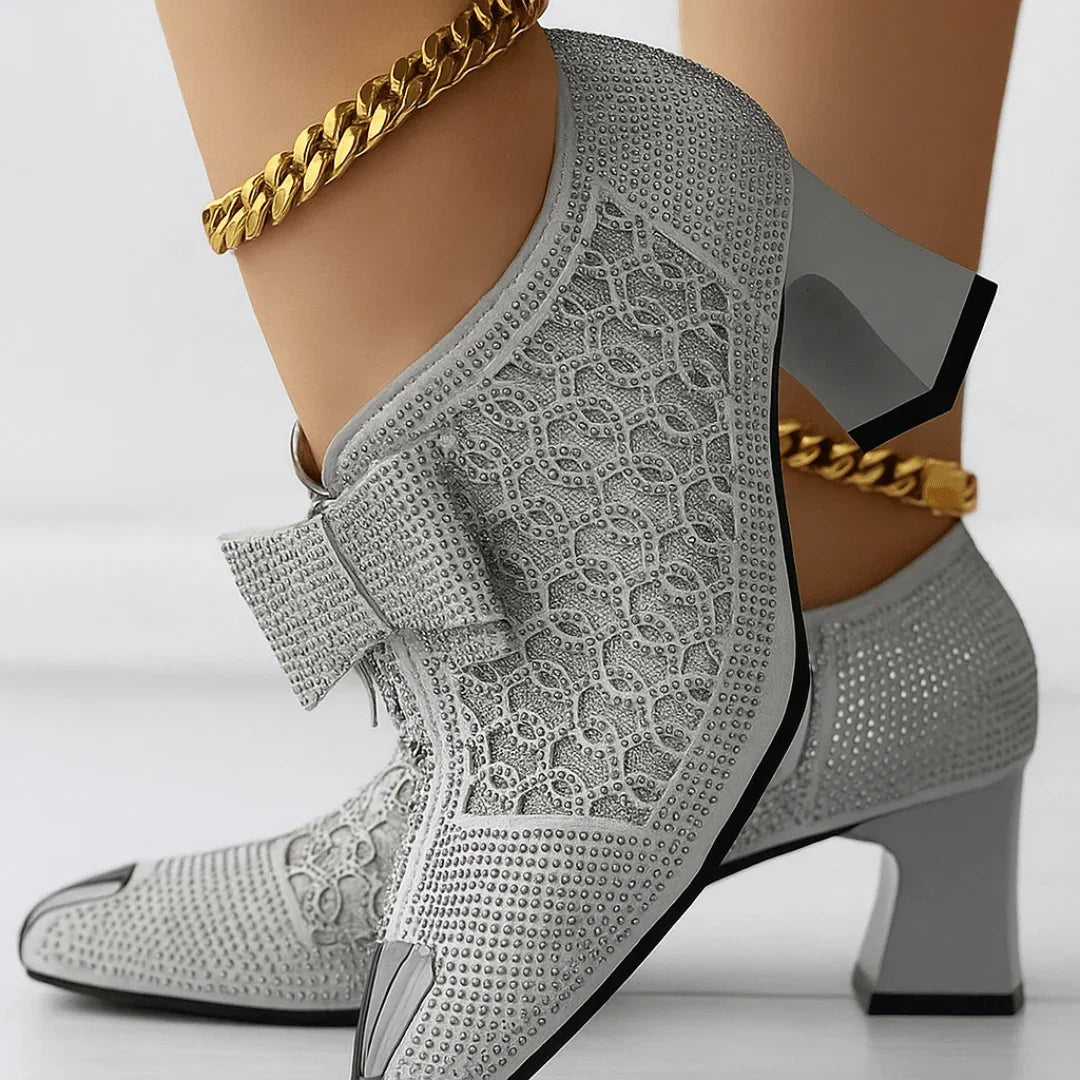 Heel worn with formal dress, seated angle