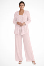 Full-length seated pose showing suit proportions