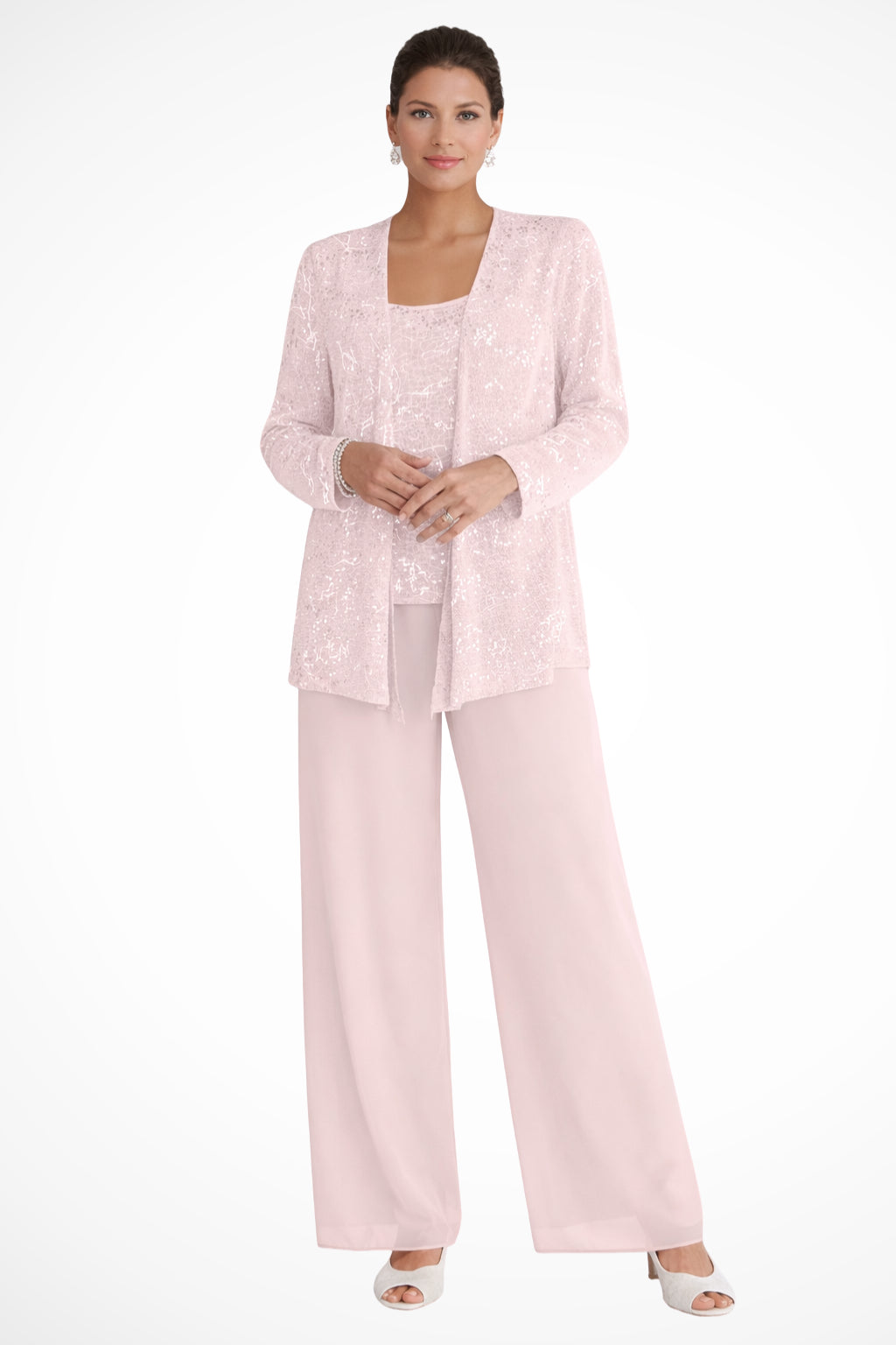 Full-length seated pose showing suit proportions