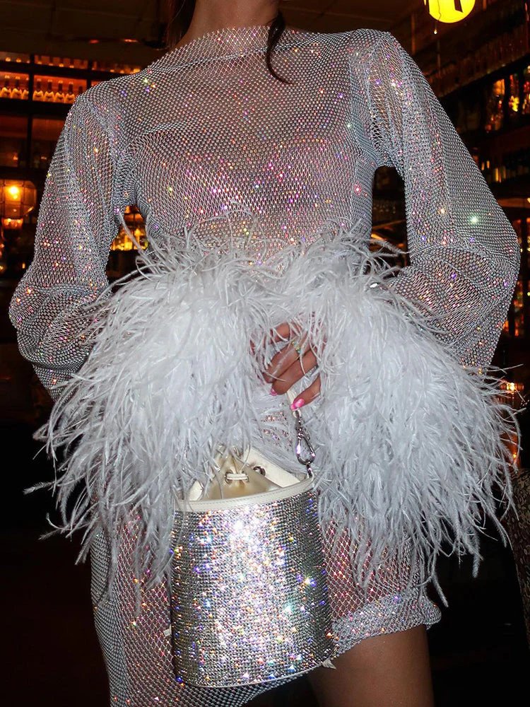Model wearing sequin mini dress, full-length pose