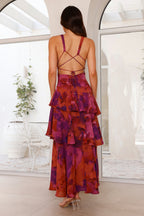 Model wearing dress, seated pose for event styling