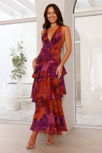 Model in maxi dress, walking pose demonstrating fabric movement