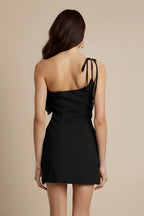 Detail shot of delicate tie neckline and shoulder strap