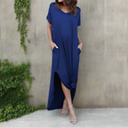 Overhead flat lay of folded v-neck maxi dress