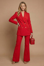 Rear view of blazer showing back seams and fit on the trousers