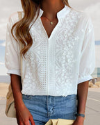 Side view of white blouse showing puff sleeve gathered detail