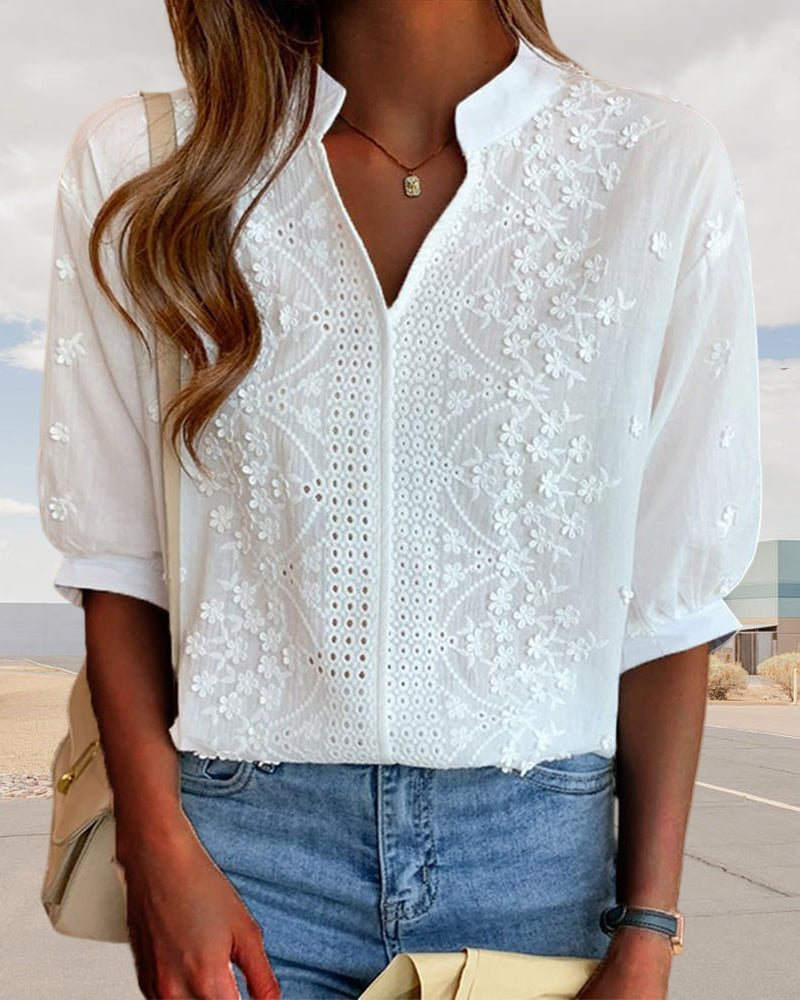 Side view of white blouse showing puff sleeve gathered detail