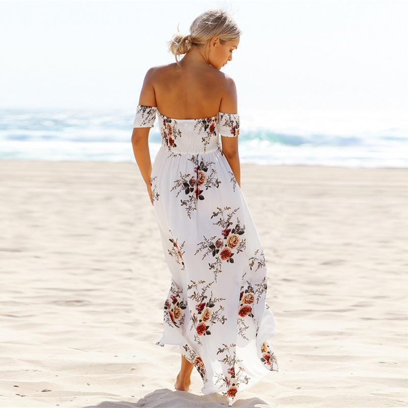 Woman in floral dress leaning, showing lightweight fabric drape