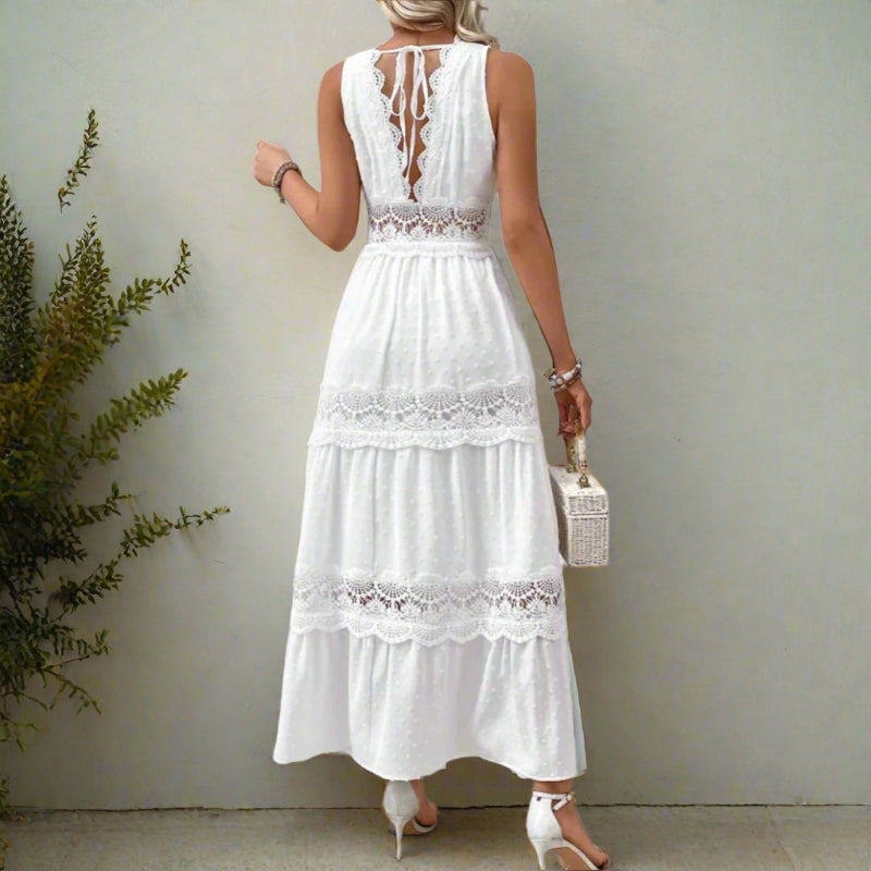 Close-up detail of lace inserts and tiered flared skirt