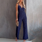 Close-up of intricate floral lace overlay and V-neckline detail