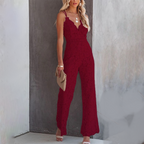 Model wearing white lace jumpsuit, full-length pose
