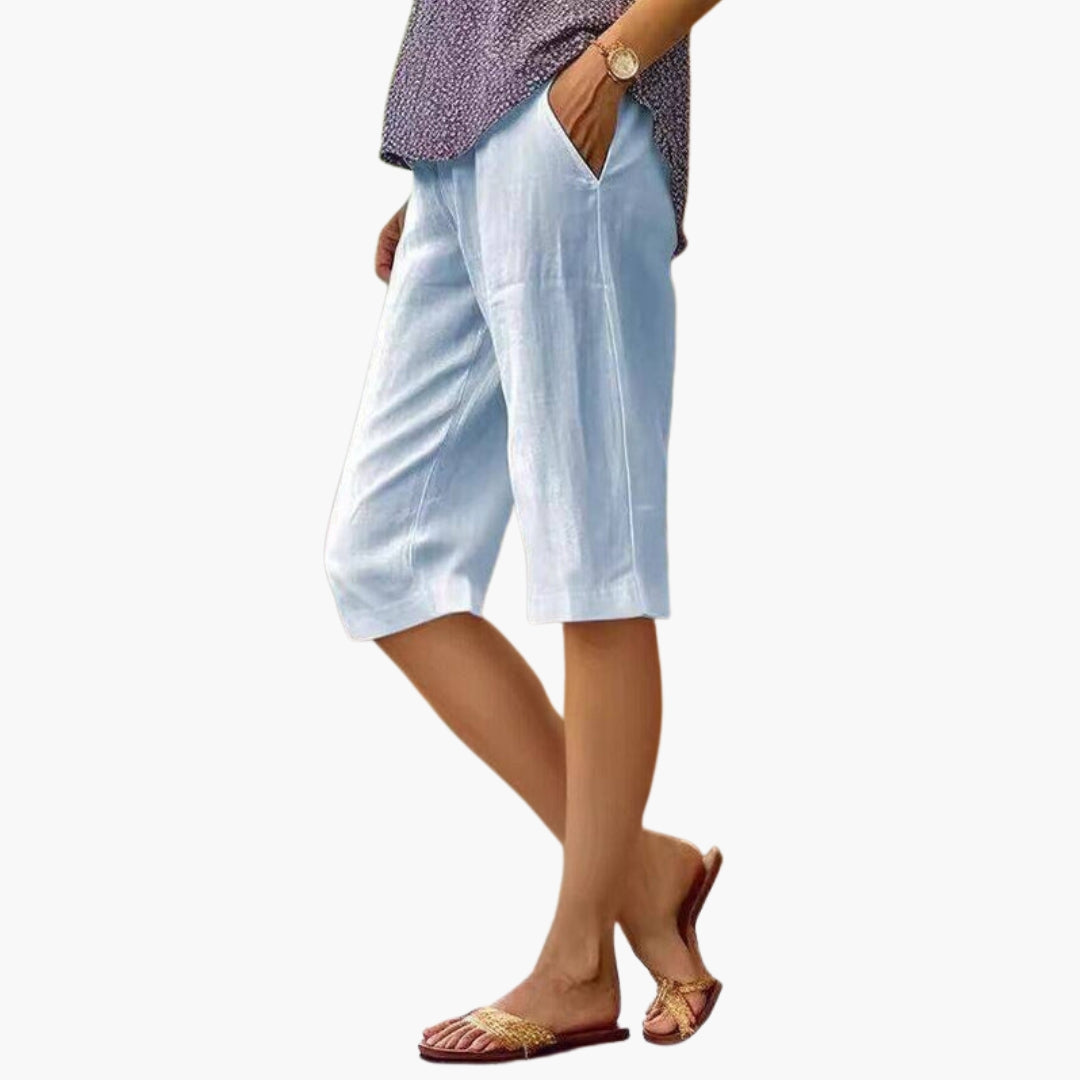 Back view showing relaxed silhouette and knee length cut