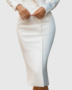 Model wearing blazer midi dress, three-quarter back view