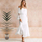 Woman wearing off-shoulder lace sleeve maxi dress, front view