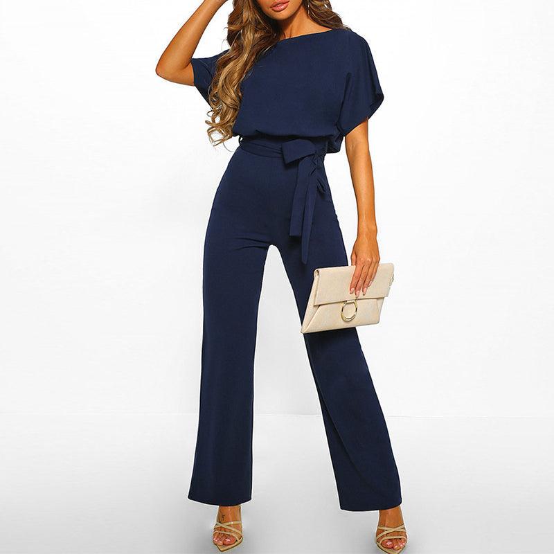 Close-up of the wide leg trousers drape and fit