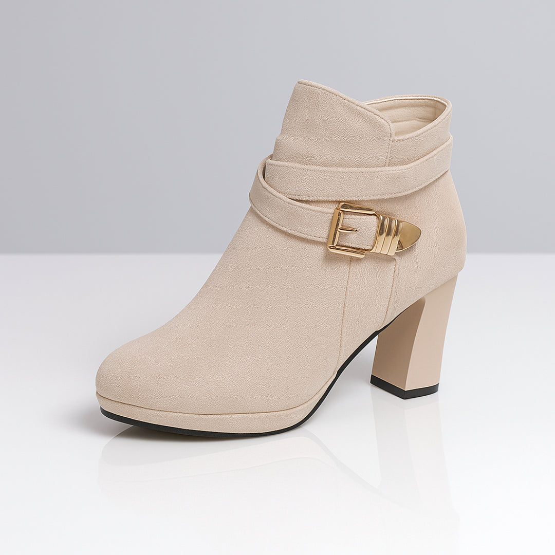 Top-down view of suede ankle boot toe and platform detail