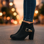 Model wearing beige suede ankle boots, standing pose