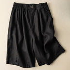 Full-length view from behind, highlighting wide leg hem
