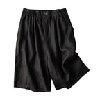 Flat lay product shot of folded linen shorts