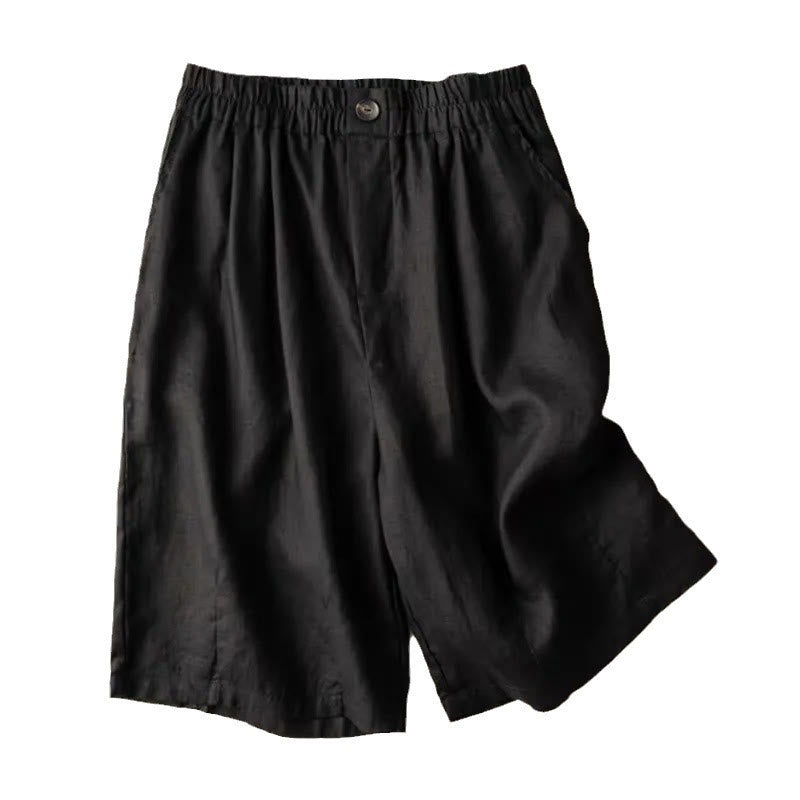 Flat lay product shot of folded linen shorts