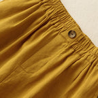 Back view of linen shorts showing relaxed fit and side pocket details