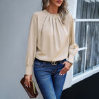 Women's beige pleated high neck blouse, relaxed fit, front view