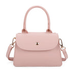 Mini handbag worn crossbody with detachable shoulder strap