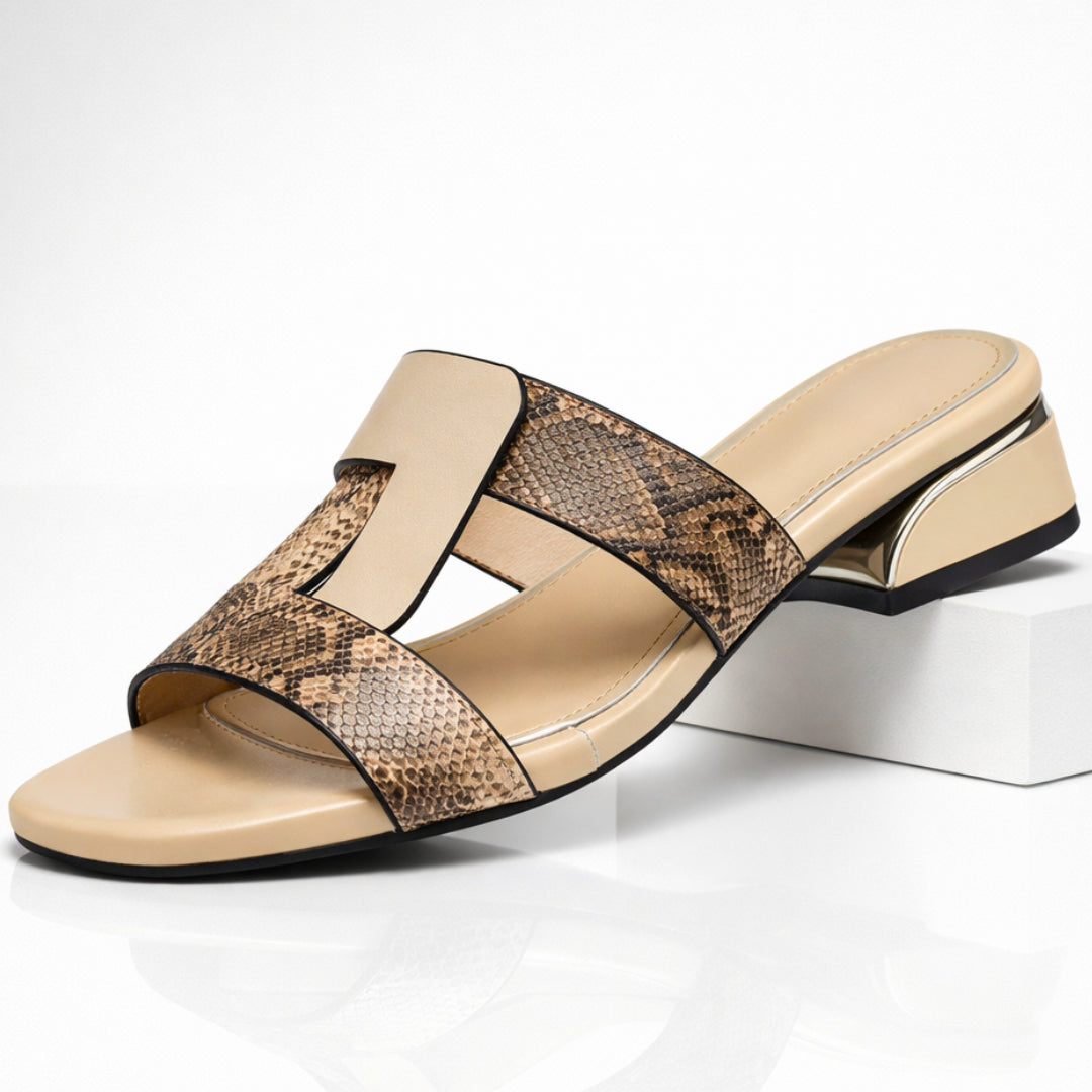 Close-up of metallic heel detail on the block heel