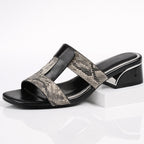 Top-down view of sandal showing snake print pattern across leather