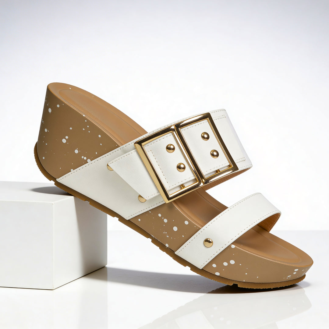Model wearing speckled buckle wedge sandals, full-length standing pose