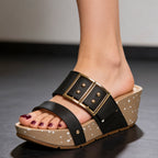 Model walking in speckled buckle wedge sandals, action shot