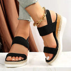 Side profile of platform espadrille sandal showing cushioned sole