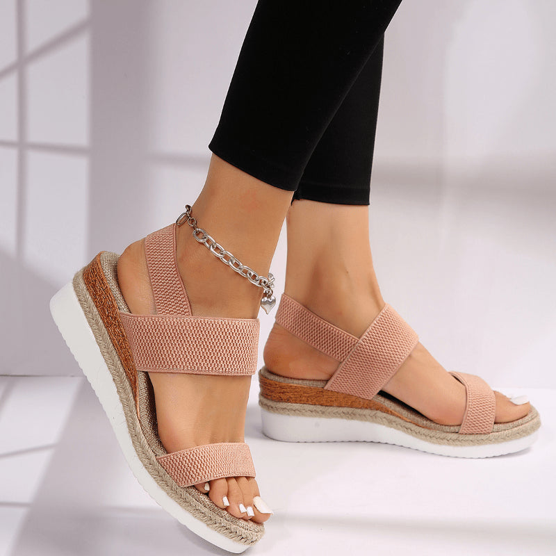Close-up of textured espadrille platform sole and elastic strap detail