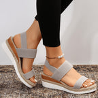 Model in relaxed outfit pairing platform espadrille sandals with casual wear