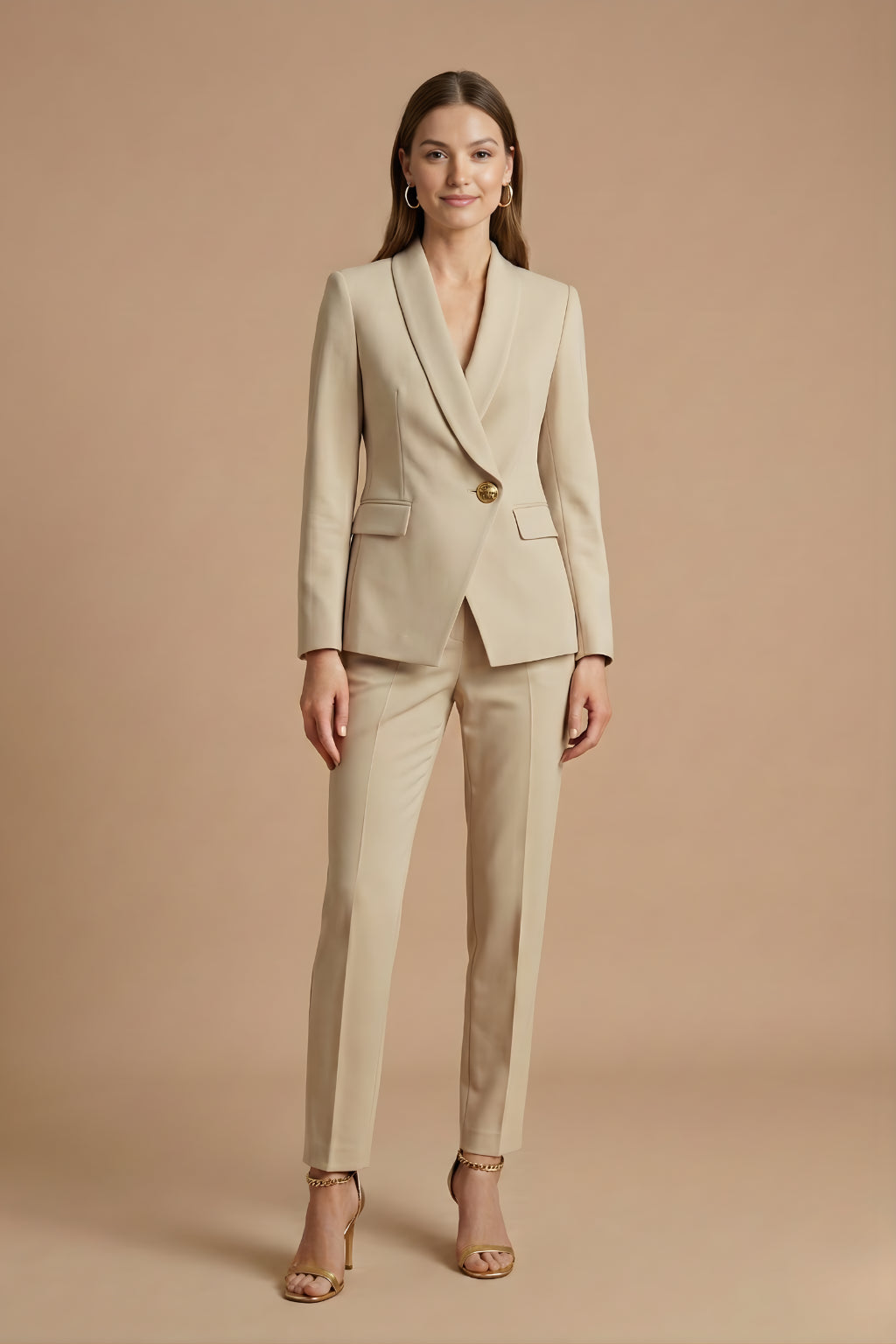 Woman wearing shawl lapel blazer and straight-leg trousers, front facing pose