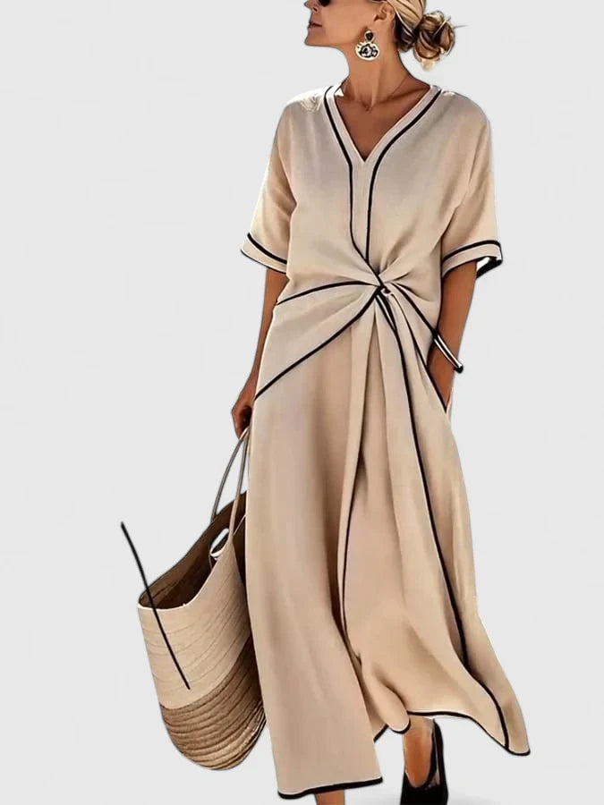 Women's maxi dress with V-neckline, contrast trim and twist front detail, full length view