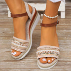 Model wearing sandals, seated pose showing comfort fit