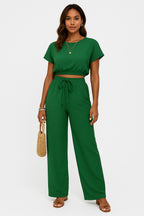 Wide leg trousers with adjustable drawstring waist, side angle